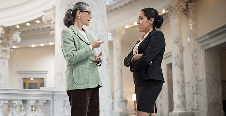 Two individuals are chatting